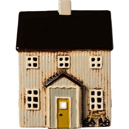 Ib Laursen Lichthaus Visby mit schwarzem Dach und Fahrrad